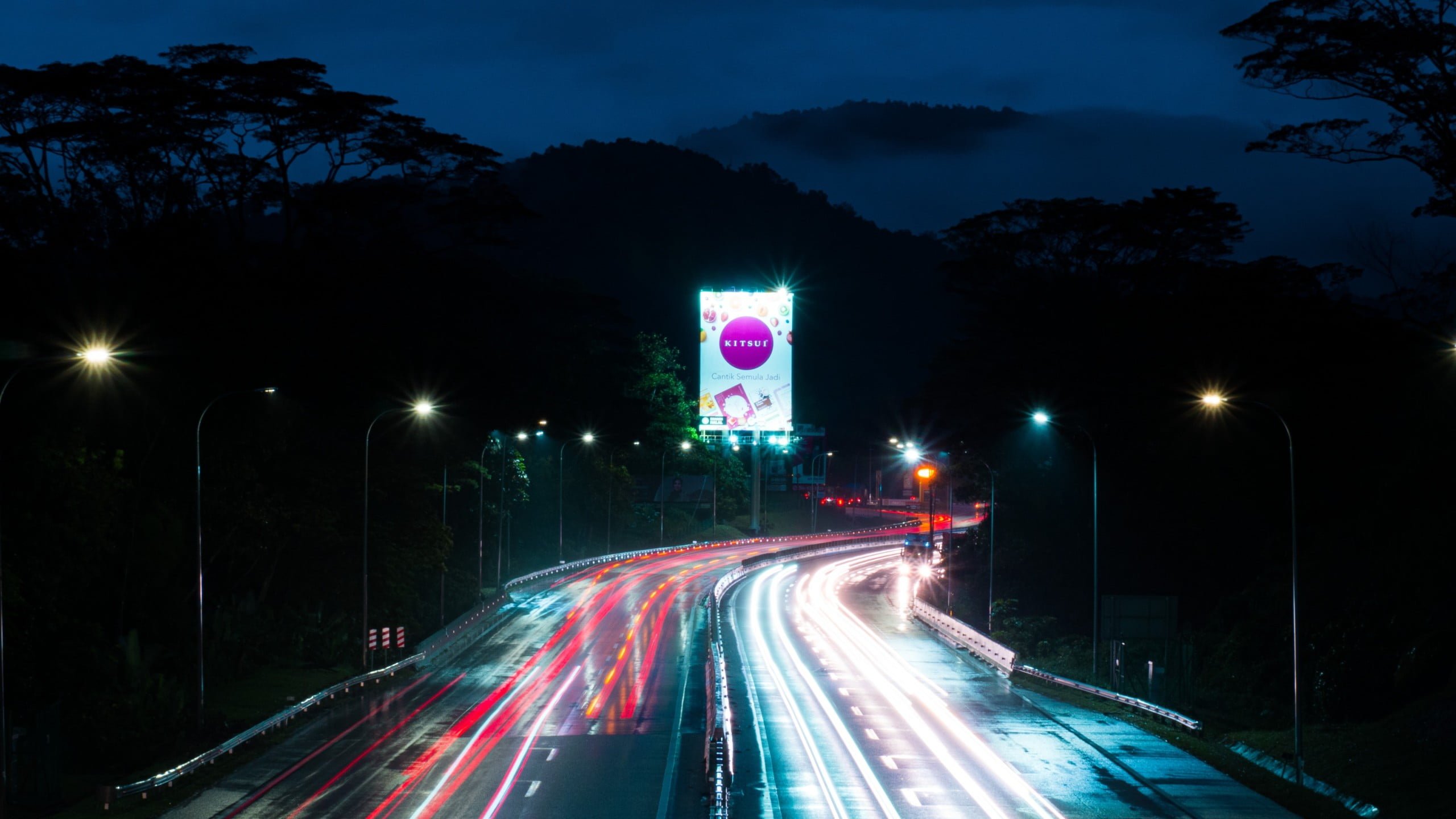 photo of an expressway on a rainy night.