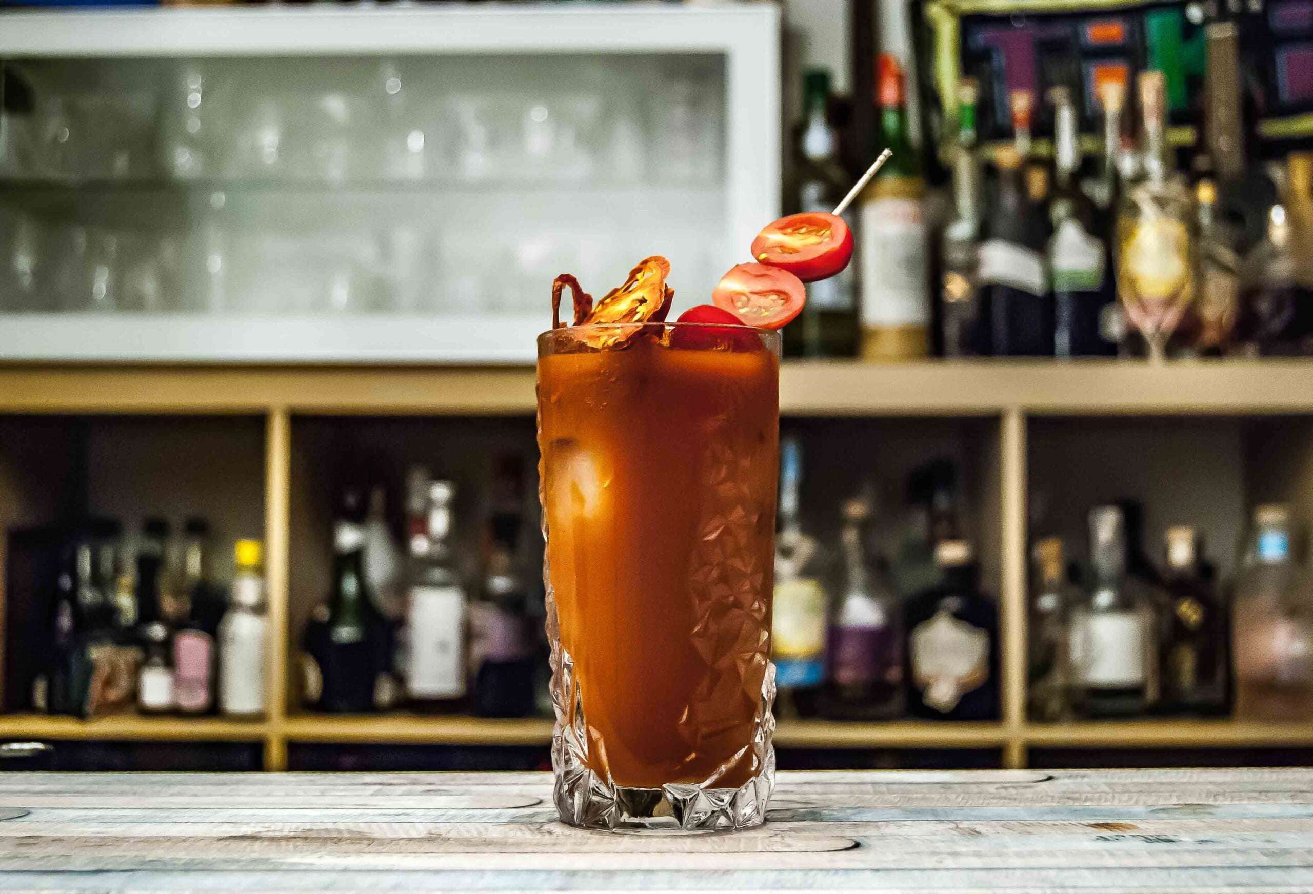 A classic Bloody Mary cocktail, garnished with fresh and dried tomatoes!