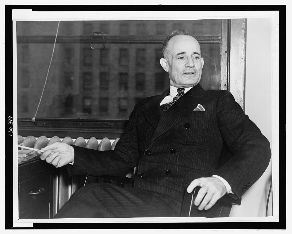 Napoleon hill attorney and journalist three quarter length portrait seated